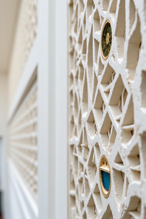 Close-up of the intricate geometric patterns on the palace walls.
